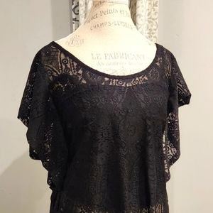 Black lacey top, it can be dressed up or down paired with jeans.